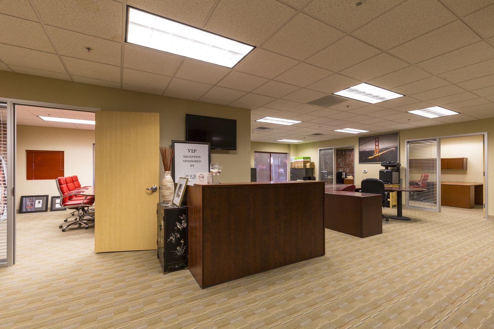 Open office and reception with conference room beyond