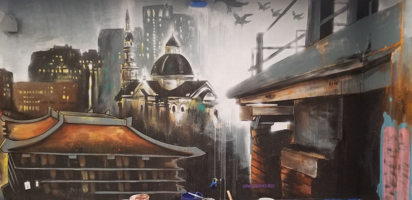 Gotham-themed feature wall mural in a law office suite