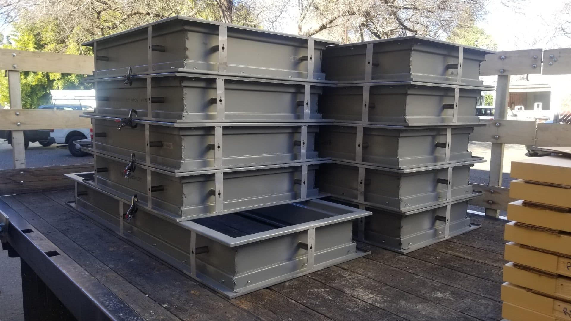 Fabricated steel window surrounds staged on the delivery flatbed