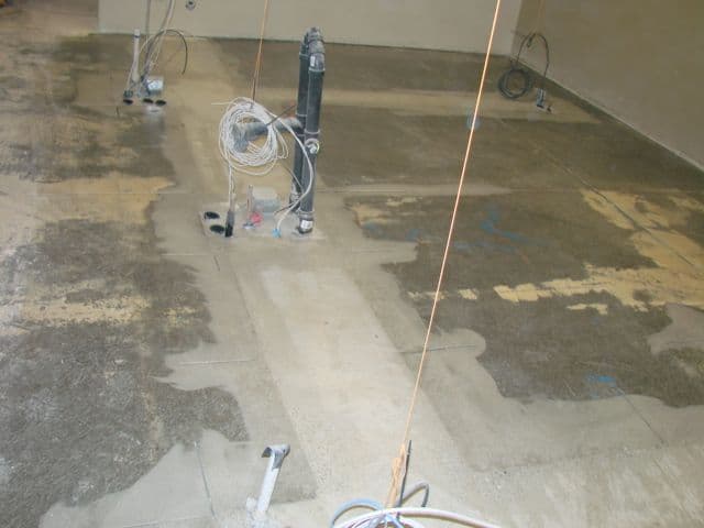 During construction: slab trenched for plumbing