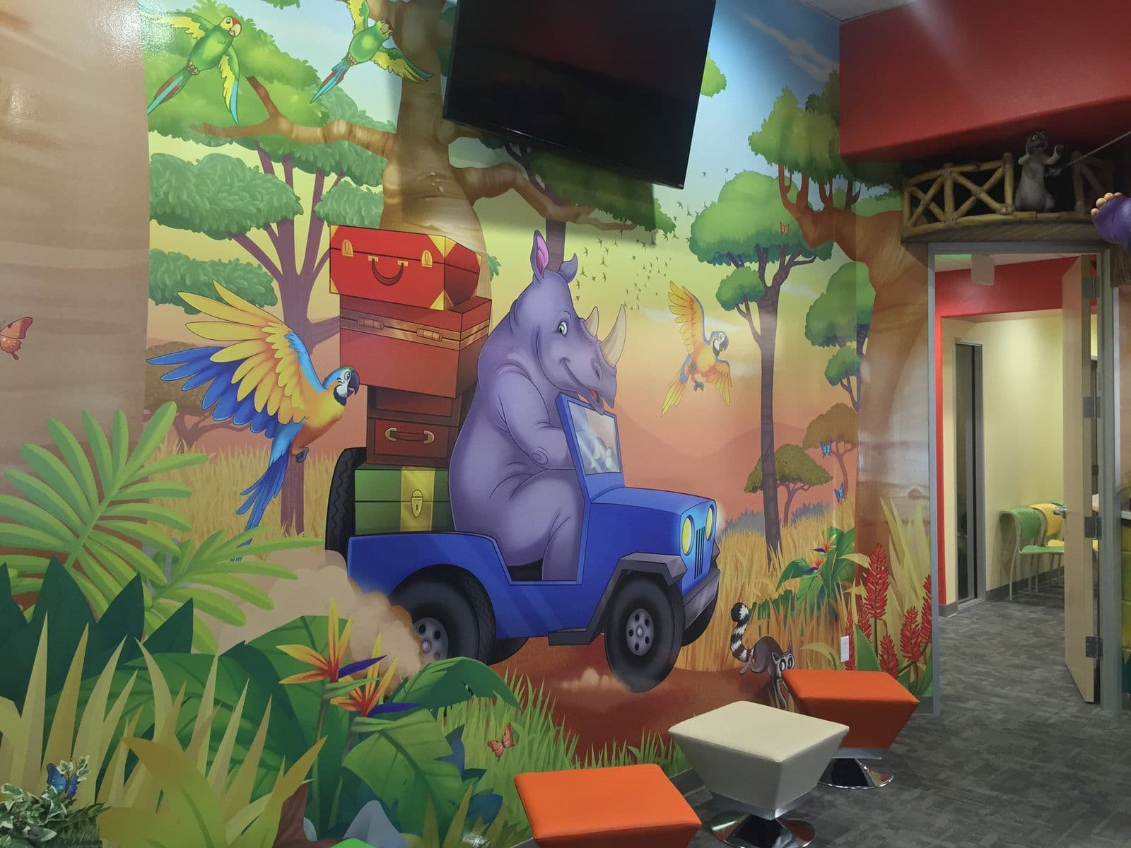 Themed waiting area with mural